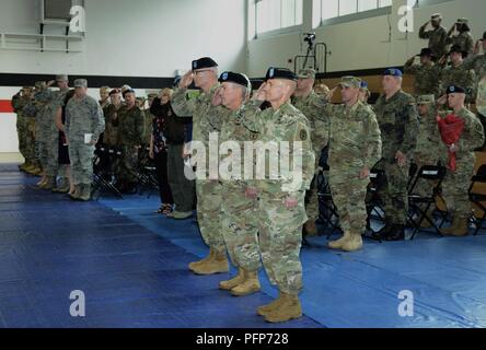 Regional Health Command Europe hosted a change of command ceremony, May 23, 2018 at Sembach Kaserne, Germany. Brig. Gen. Ronald Stephens (right) assumed command from Brig. Gen. Dennis LeMaster (left). Maj. Gen. Jeffrey Clark (center), U.S. Army Medical Command Deputy Commanding General (Operations), presided over the ceremony Stock Photo