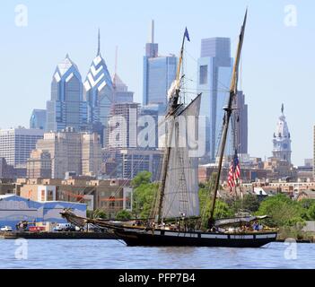 Coast Guard assets from Coast Guard Sector Delaware Bay and the Coast Guard Auxiliary in Philadelphia enforce a safety zone for the parade of sail for Sail Philadelphia 2018 as tall ships from around the world transit the Delaware River in Philadelphia, May 24, 2018. Ships will be docked along the Delaware River Waterfront from Market Street to the end of the Penn’s Landing Marina. Stock Photo