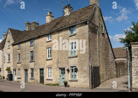 Traditional 3 storey terrace houses in the Cotswold village of Sherston, Wiltshire, England, UK Stock Photo