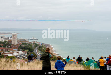 The red arrows performing and flying in formation at an air show. This particular air show was Eastbourne Airbourne, East Sussex, UK. Stock Photo