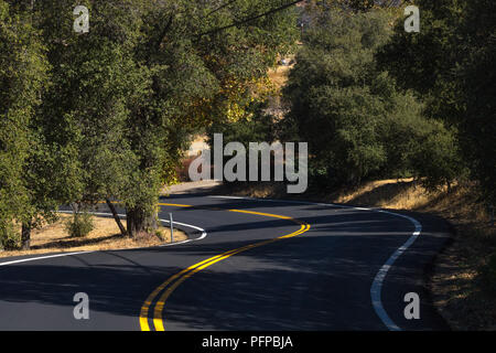 Two lane, winding paved country road in southern California, new asphalt, mountain road Stock Photo