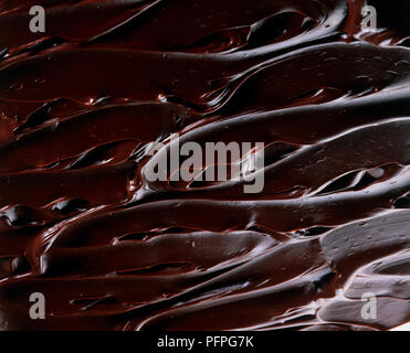 Melted chocolate drink on dark background. Hot beverage Stock Photo - Alamy