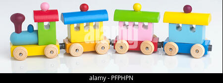 Colourful wooden toy train Stock Photo