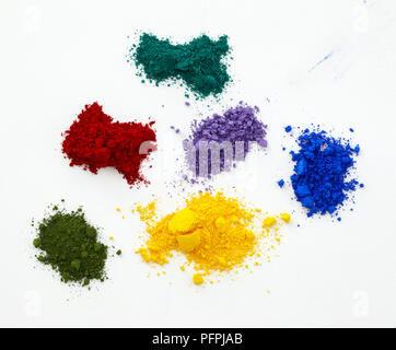 Coloured powder pigment on white background Stock Photo - Alamy