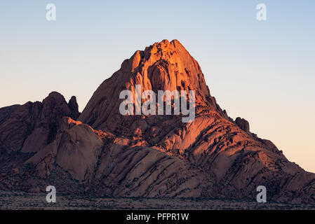 Close up of rock patterns of granite mountain at sunrise in Spitzkoppe, Namibia Stock Photo