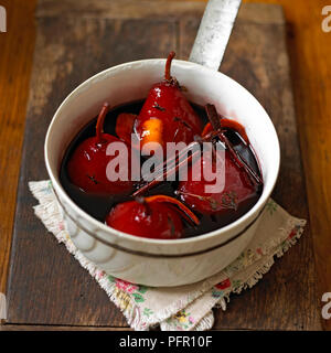 Pears poached in red wine Stock Photo