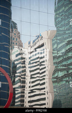 South Korea, Seoul, Yeongdeungpo-gu, skyscrapers reflected in glass facade Stock Photo