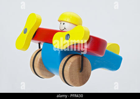 Wooden airplane and pilot toy Stock Photo