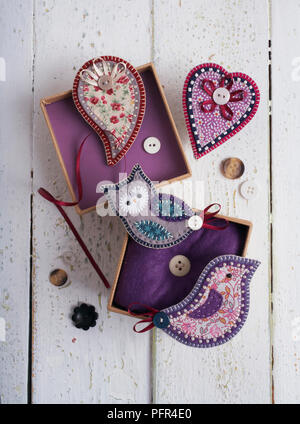 Hand-made fabric brooches and gift box Stock Photo