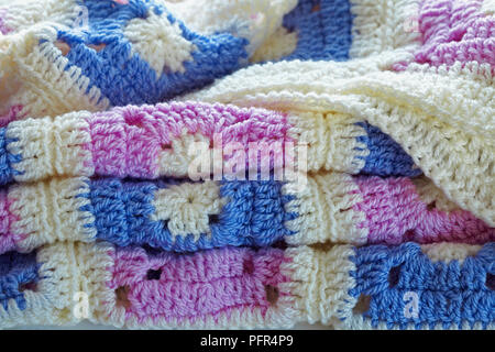 Crocheted patchwork throw, folded up Stock Photo