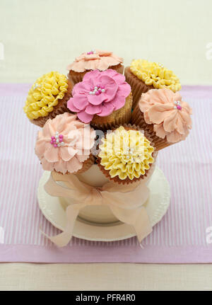 Bunch of flower cupcakes arranged to form a bouquet Stock Photo