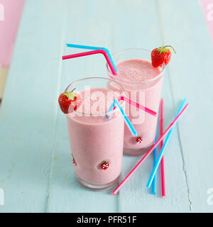 Two glasses of strawberry smoothie Stock Photo