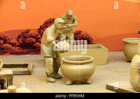 China clay sculpture, labor scene Stock Photo