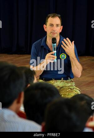 NHA TRANG, Vietnam (May 22, 2018) British Royal Navy Lt. Cmdr. Mark Middleton, currently assigned to the Military Sealift Command hospital ship USNS Mercy (T-AH-19), delivers remarks during a Humanitarian Assistance and Disaster Relief symposium. Mercy is currently deployed in support of Pacific Partnership 2018 (PP18). PP18’s mission is to work collectively with host and partner nations to enhance regional interoperability and disaster response capabilities, increase stability and security in the region, and foster new and enduring friendships across the Indo-Pacific Region. Pacific Partnersh Stock Photo