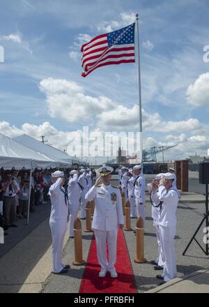 NORFOLK (May 26, 2018) Chief of Naval Operations (CNO) Adm. John Richardson passes through sideboys during a memorial ceremony in honor of USS Scoprion (SSN 589) Sailors who were lost at sea 50 years ago.  Held at the Scorpion Memorial on Naval Station Norfolk, the ceremony was attended by over 500 family members, friends and Shipmates of the 99 crewmembers lost.  Speakers for the event were Chief of Naval Operations, Admiral John Richardson; Captain (retired) Bill Richardson, CNO’s father and former Scorpion crewmember; Vice Admiral Joe Tofalo, Commander, Submarine Forces; and Captain Maryett Stock Photo