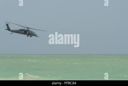 HH-60G Pave Hawks from the 920th Rescue Wing at Patrick Air Force Base in Cocoa Beach, Florida perform a combat search and rescue demonstration at Miami Beach, Florida on May 26th, 2018 during the 2nd annual National Salute to America's Heroes Air and Sea Show. The two-day event showcases military fighter jets and other aircraft and equipment from all branches of the United States military in observance of Memorial Day. Stock Photo