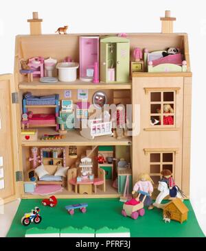Rooms in doll's house, and garden Stock Photo