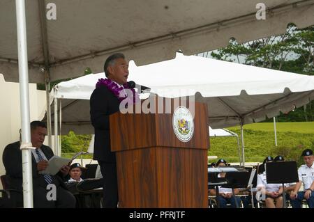 Hawaii Governor David Y. Ige speaks at the 2018 Governor’s Veterans Day Ceremony at the Hawaii State Veterans Cemetery in Kaneohe, Hawaii, May 28, 2018.  The theme for the ceremony was “Honoring Our Fallen Warriors and Gold Star Families” which included a parade of flags, presentation of floral leis and music from the 111th Hawaii Army National Guard Band. Stock Photo