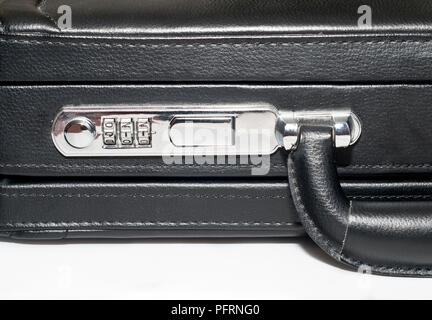 Black briefcase with 911 combination on the lock, close-up Stock Photo