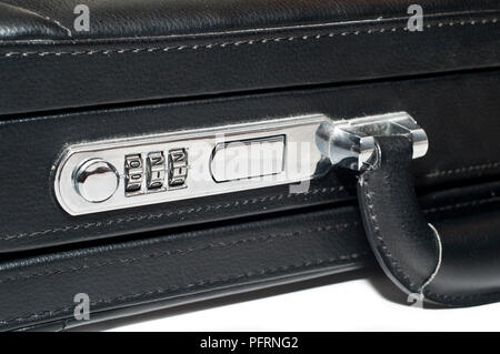 Black briefcase with 911 combination on the lock, close-up Stock Photo