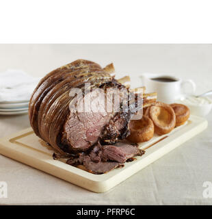 Roast beef with Yorkshire puddings Stock Photo