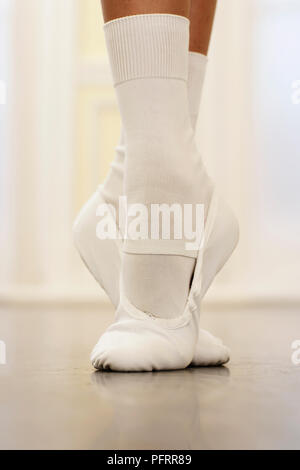 Close-up on ballet dancer's feet Stock Photo