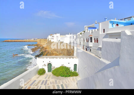 White blue houses on the Atlantic coast in Asilah, Morocco Stock Photo