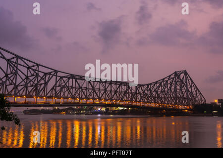 Howrah bridge - The historic cantilever bridge on the river Hooghly during the night in Kolkata, India Stock Photo