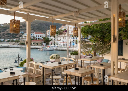 Cozy summer restaurant in picturesque Batsi village on  Andros island, Cyclades, Greece Stock Photo