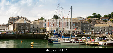 UK, Cornwall, Padstow, boats moored in inner harbour in front of South Quay, panoramic Stock Photo