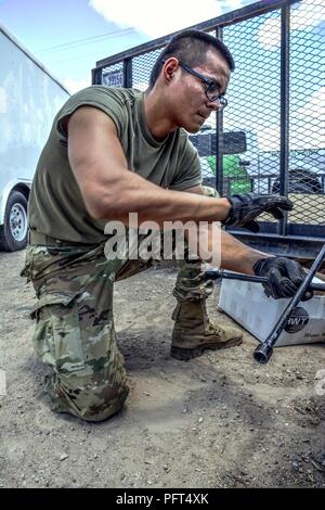A Texas Guardsmen from El Paso based 3rd Battalion 133rd Field 