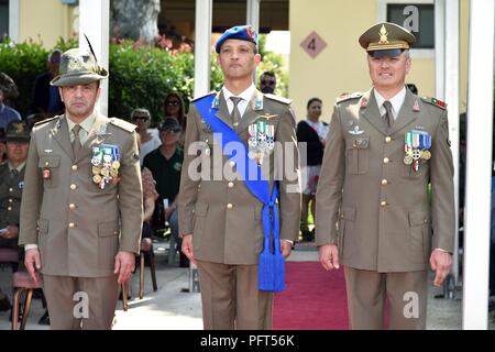 (From Left), Italian Army outgoing Command Sgt. Maj. Antonio Quaglia, Colonel Umberto D’Andria, Italian Base Commander and Incoming Command Sgt. Maj. Ennio Zavagno prepare to march on to the parade field during the Italian Base Command Change of Responsibility at Caserma Ederle in Vicenza, Italy, May 31, 2018.