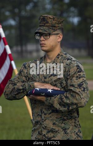 U.S. Marine Corps Col. Aaron Brunk, left, Joint Exercise Support Group ...