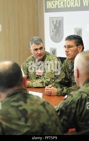Brig. Gen. Clint Walker, commander of 184th Sustainment Command and Polish Brig. Gen. Darius Łukowski, Cheif of Inspectorate for Armed Forces Support are briefed on operations the upcoming exercise Saber Strike 18, on 30 May 2018. Participation in multinational exercises such as Saber Strike enhances our professional relationships and improves overall coordination with allies and with partner militaries during times of crisis. (Mississippi National Guard Stock Photo