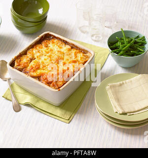 Shepherd's pie with side serving of green beans Stock Photo