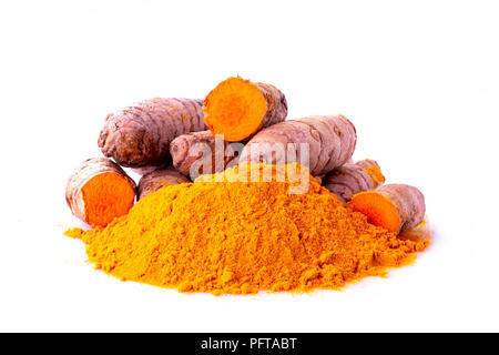 curcuma turmeric spice roots and ground isolated on white background Stock Photo