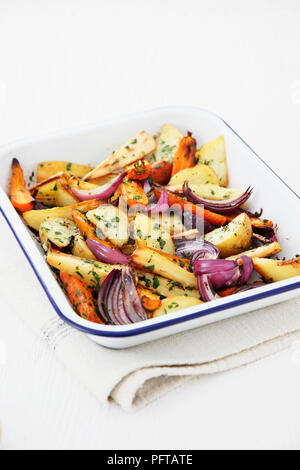 Herby roasted root vegetables Stock Photo