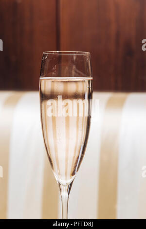 Prosecco glass in an elegant bar with vintage pop colors Stock Photo