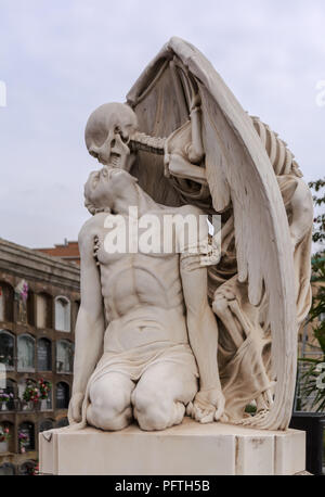 The Kiss of Death statue in Poblenou Cemetery in Barcelona. This marble sculpture depicts death, as a winged skeleton, kissing a handsome young man. T Stock Photo