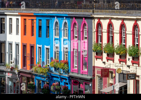 Colourful shop fronts on Victoria Terrace, Edinburgh, during the festival Stock Photo