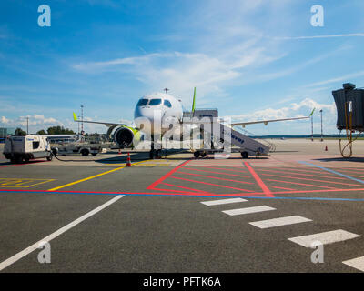 Airbaltic airlines airplane boarding at the domestic airport at day time Stock Photo