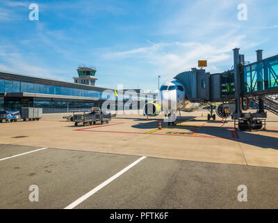 Airbaltic airlines airplane boarding at the domestic airport at day time Stock Photo