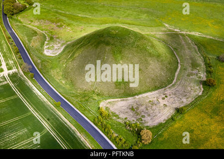 Silbury Hill with A4 road in Wiltshire Stock Photo