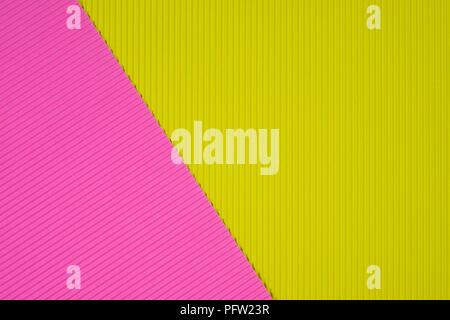 Pink and yellow corrugated paper texture, use for background. vivid colour with copy space for add text or object. Stock Photo