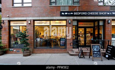 [historical storefront] Bedford Cheese Shop, 265 Bedford Ave, Brooklyn, NY. exterior storefront of a cheese shop in the Williamsburg neighborhood. Stock Photo