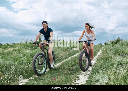 Fat bike also called fatbike or fat-tire bike in summer driving  Stock Photo