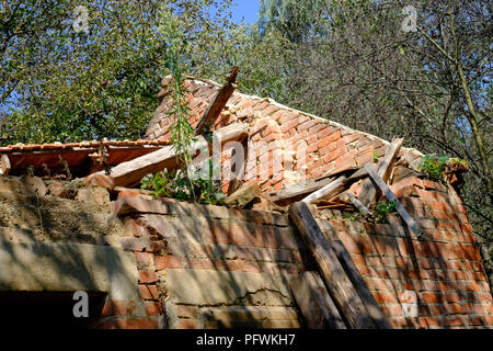 remnants of crumbling neglected summer kitchen outbuilding in a rural village zala county hungary Stock Photo