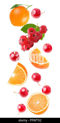 Flying orange and red currant isolated on white Stock Photo
