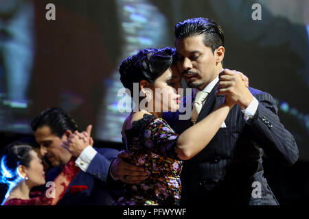 Buenos Aires, Argentina. 21st Aug, 2018. The couple from Buenos Aires, made up by Carla Rossi and Jose Luis Salvo, are the new winners of the world tango championship, in the category Salon Tango. The final took place today in the Luna Park stadium. Couples from Argentina, Colombia, Italy, Russia, Spain, Holland and Brazil participated in the final of the tournament, which included hundreds of participants from all over the world. Credit: Gustavo Pantano/Pacific Press/Alamy Live News Stock Photo