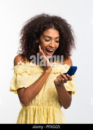 Beautiful Girl in a Yellow Dress Near the Rocks Stock Image - Image of  ocean, people: 66232779